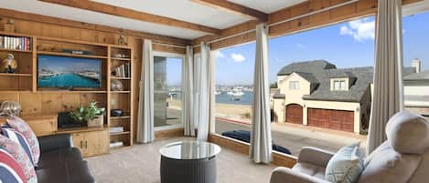 Come and enjoy gorgeous bay views from our historic upstairs charmer, close to the best of Newport, but on a quiet residential street.