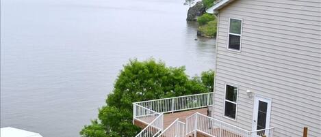 Side view of home and part of dock showing lot and waterfront location