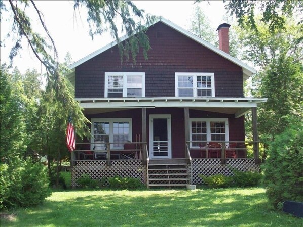 A view of the Cottage from Caspian Lake beach...only a few feet to the water!