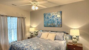 Master Bedroom with pillow top king mattress, cable TV, bathroom with tub shower
