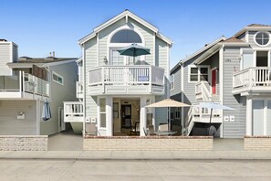 Street view of the entire ocean view duplex. This listing pertains to the downstairs 3 bd/2 ba unit only. The upper unit can also be rented when available.
                