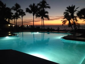 Awesome heated condo pool with relaxing whirlpool jacuzzi at sunset....