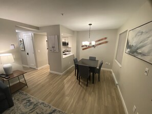 A look at eating area and kitchen from the living space.