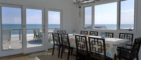 large dining table with seating for 9 and ocean views!