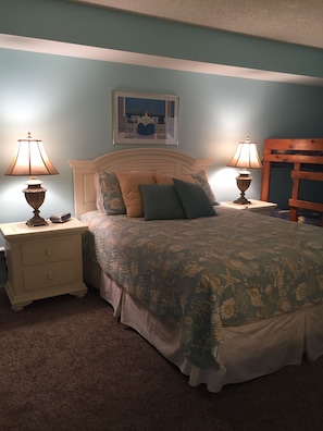 Bedroom with Queen bed and a set of bunk beds