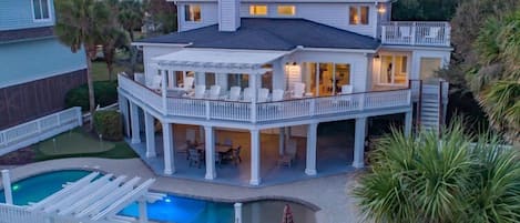 Back of house with ocean views