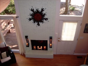 For a romantic evening we provide candles for the former fireplace.