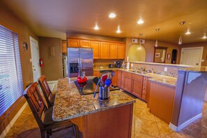 Kitchen with all the cooking gadgets and supplies you need for meals at home.