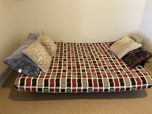 Queen Sized Futon in main master, great for family with couple of small children