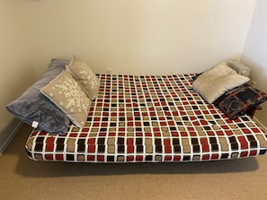 Queen Sized Futon in main master, great for family with couple of small children