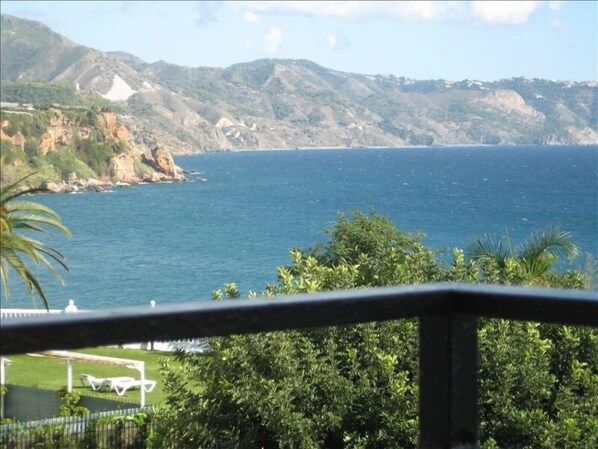 Fantastic view from the balcony.  Enjoy meals here! Parador lawn seen next door.