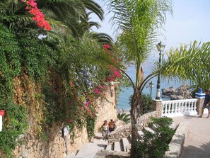 Stairway to beach is located across street and by roundabout