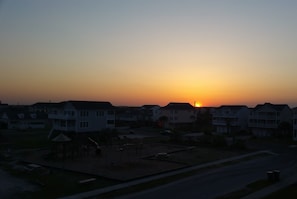 Sunset from the deck. Camera in one hand, drink in the other. 