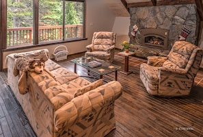 Living Room with Gas Fireplace insert, 42" TV (not shown in this picture) reclining/swiveling easy chairs