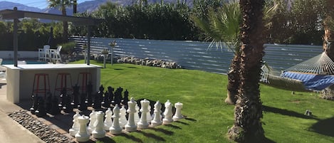 Giant chess set, large grassy yard, hammock and beautiful mountain views