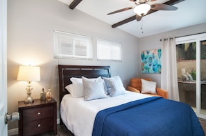 Guest bedroom #2 with sliding glass doors/access to patio