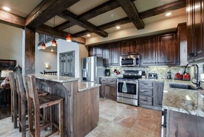 TWO gourmet kitchens with granite counter tops and stainless appliances!