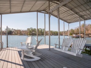 Large covered dock with great relaxing area.