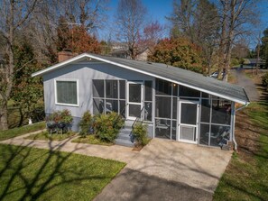 Front of cottage showing both screen porch.