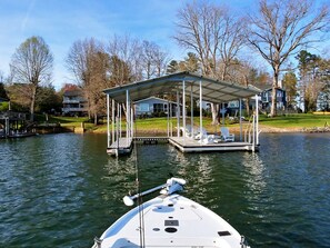 Boat slip, dock, our house, neighborhood.  