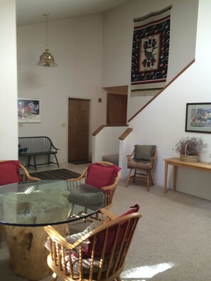 Entrance, stairway, with table for cards/games and dining for 6