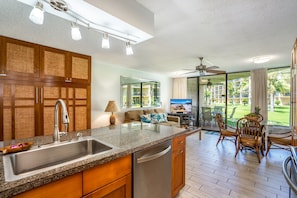 AC, SS sink with garbage disposal and SS appliance, tile flooring. Murphy bed.