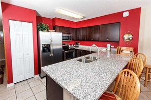 Kitchen and breakfast bar.