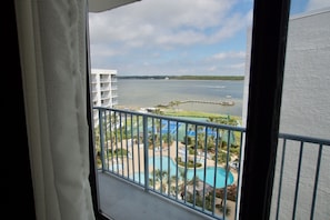 Looking through the bedroom window over our pool and out to the Little Lagoon.
