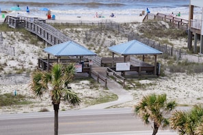 Our gazebo's and board with a peak at our beach.
