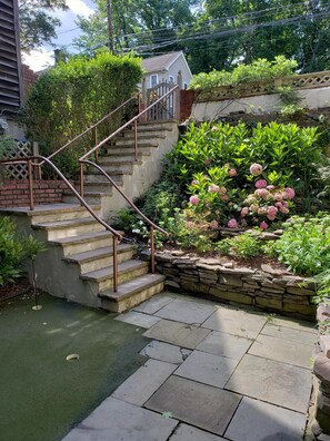 Steps going down to  Garden Apartment from the street.