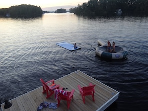 Water bouncer, floating lily pad, kayaks, canoe are among waterside toys.