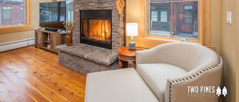 Wood burning fire place. Wood stocked in garage