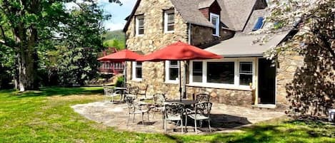 The Red Bridge Lodge Rear patio w/ Old Red Bridge in background.  