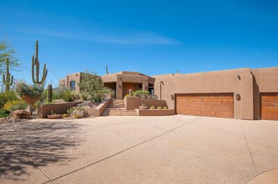 Front Entrance View.  Three Car Garage.  Third Bay Not Pictured.
