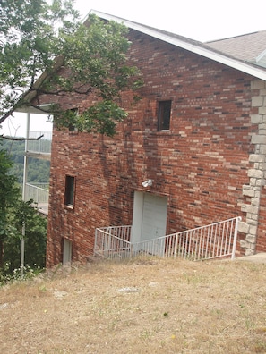 Side view of house. Three story but top two fro rent.