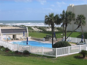 view of pool & ocean from our balcony