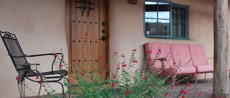 West portal in courtyard with xeriscaping 
