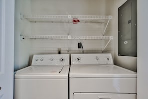 Laundry is in condo in kitchen