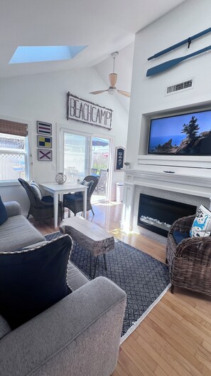 Light and bright updated beach cottage complete with central A/C and heat.
