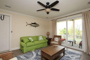 Living Area with waterfront Balcony Access