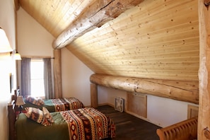 Loft bedroom with 3 twin beds