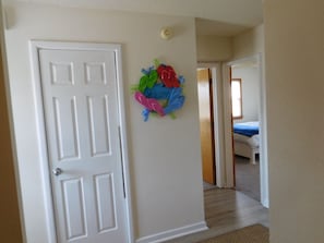 Hall leading to 3 bedrooms and bath on second floor 