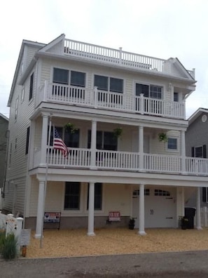 Decks off living room, master bedroom and large rooftop deck