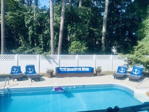 Large in-ground pool & grill for cooking.  Cushioned lounge sofa and recliners