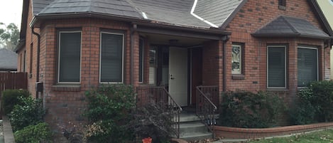 Our House. The Guest House is accessed from the side gate. 