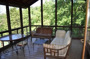 Screened porch provides the perfect place to view the pond and sunsets.