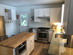 Fully stocked kitchen. 