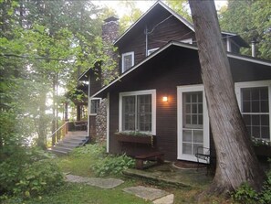 Historic home. Flagstone path to the front  porch and dock