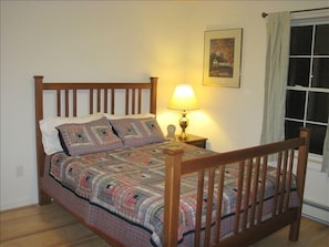 Warm and Comfortable Downstairs Bedroom. Plenty of Bureau and Closet space.