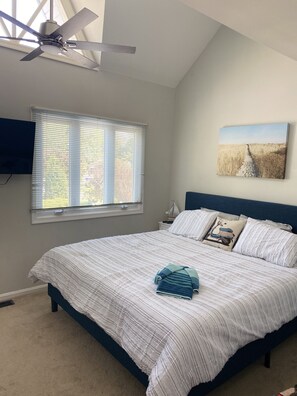 Main bedroom with King bed and smart TV with cable and streaming services 